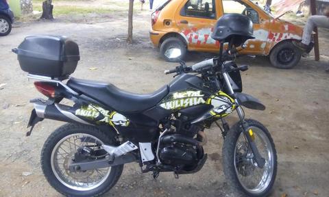 vendo mi moto tx200 año 2011 por motivo de viaje tlf 04144007166 y 04244458969