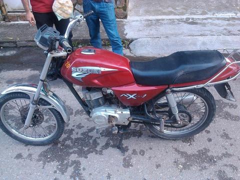 vendo moto suzuki AX100 2