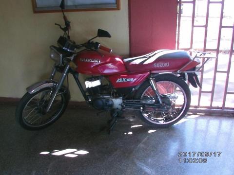 se vende ax100 suzuki año 2005