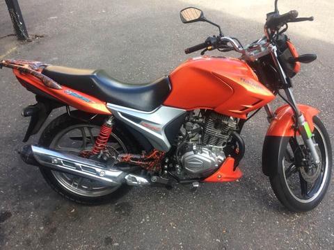 Vendo Moto HJ Cool en perfecto estado casi nueva 2014