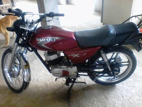 se vende moto ax100