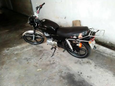 AX100 BARATAA