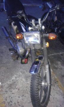 vendo mi ax 100 por motivo de viaje año 2005