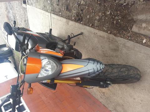 VENDO MOTO TX AÑO 2013