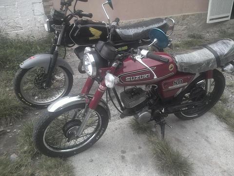 a la venta par de moticos operativas suzuki año 80 slo factura honda año 86 posee titulo