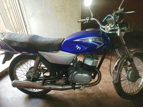 ax 100 unico dueño vendo o cambio