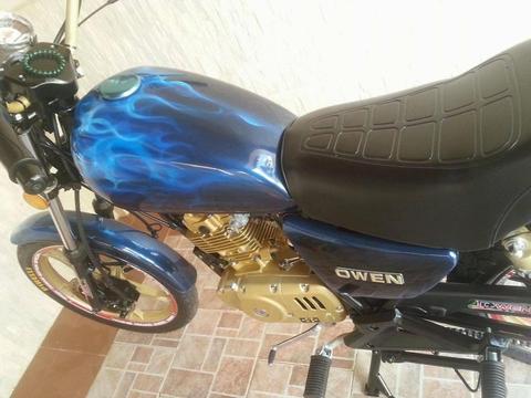 Moto Owen Relieve Gold