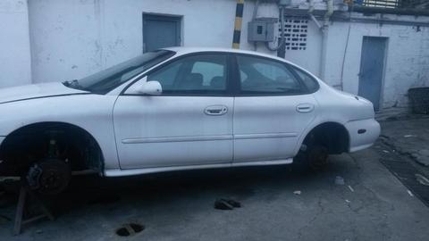 ford taurus cambio por moto