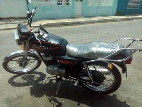 suzuki ax100 acepto cambio