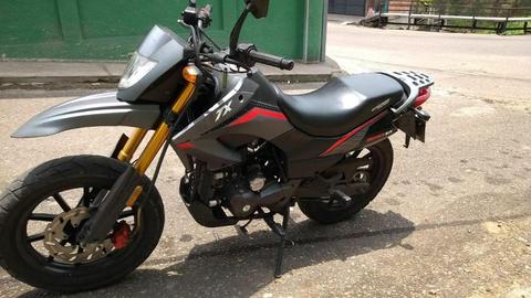 VENDO MOTO TX AÑO 2013