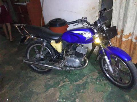 Vendo ax100 suzuki