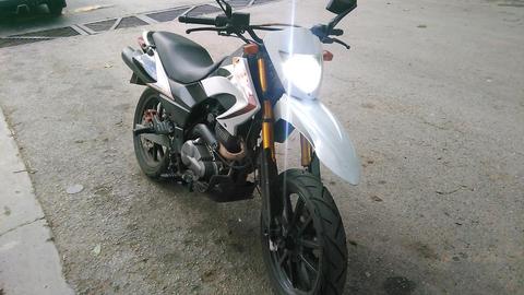 En venta moto TX año 2013 barras doradas