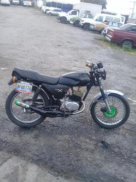 Suzuki Ax 100