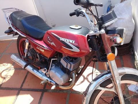 vendo moto marca Suzuki AX100